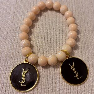 Custom Elegant Beige Beaded Bracelet with Black and Gold Accents
